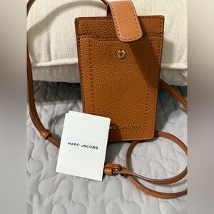 Marc Jacobs Phone Crossbody Bag
SMOKED ALMOND
Brand New